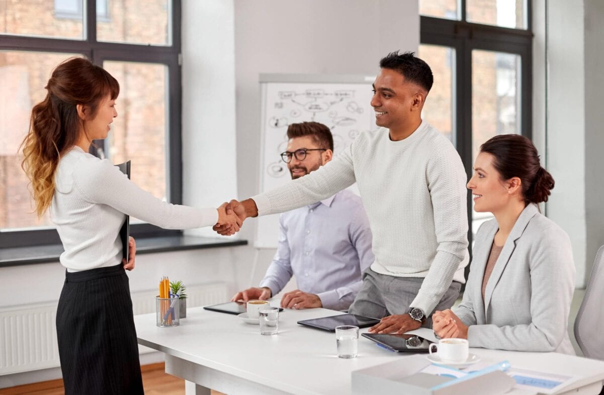 Recruiters having job interview with employee